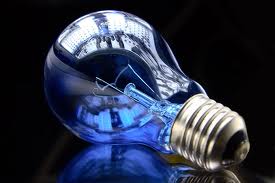 Electric bulb with reflections of buildings